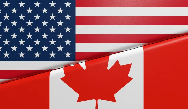 The United States and Canadian flags side by side